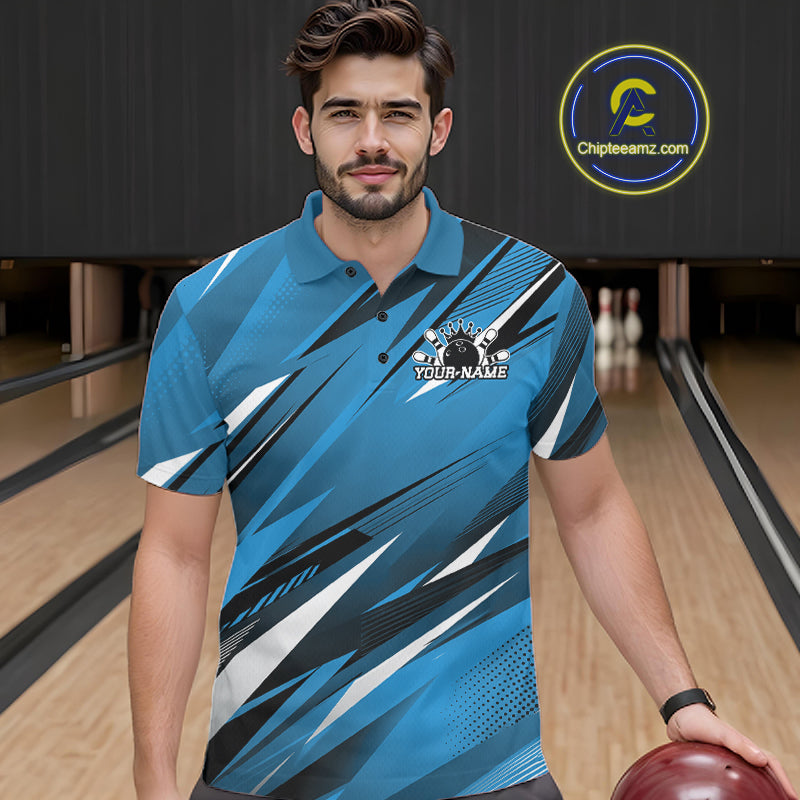 Man wearing a blue bowling shirt with personalized name on a bowling alley.