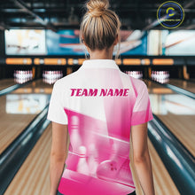Load image into Gallery viewer, Female model back view in a bowling lane wearing a white and pink polo shirt with bowling ball and pins over a pink geometric background.