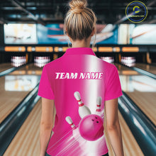Load image into Gallery viewer, Back view of a female model in a bowling lane wearing a quarter zip shirt with bowling ball and pins flowing through a pink gradient layout.