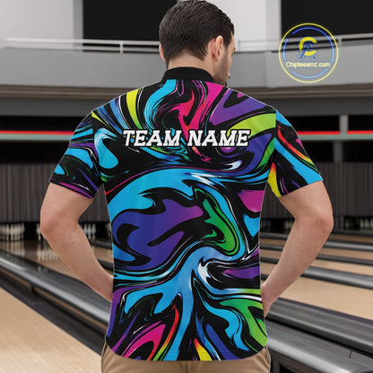 Man wearing a colorful shirt with 'TEAM NAME' text at a bowling alley.