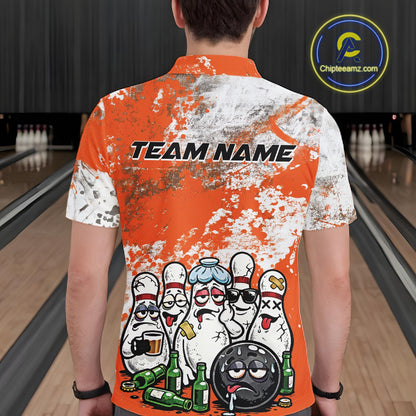 Back view of a male model in a bowling lane wearing an orange and white grunge splatter polo shirt featuring playful bowling pins and beer bottle illustration.