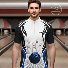 Load image into Gallery viewer, Male model wearing a white, black, and blue bowling quarter zip shirt with bowling ball knocking down pins artwork, shown from the front in a bowling lane.