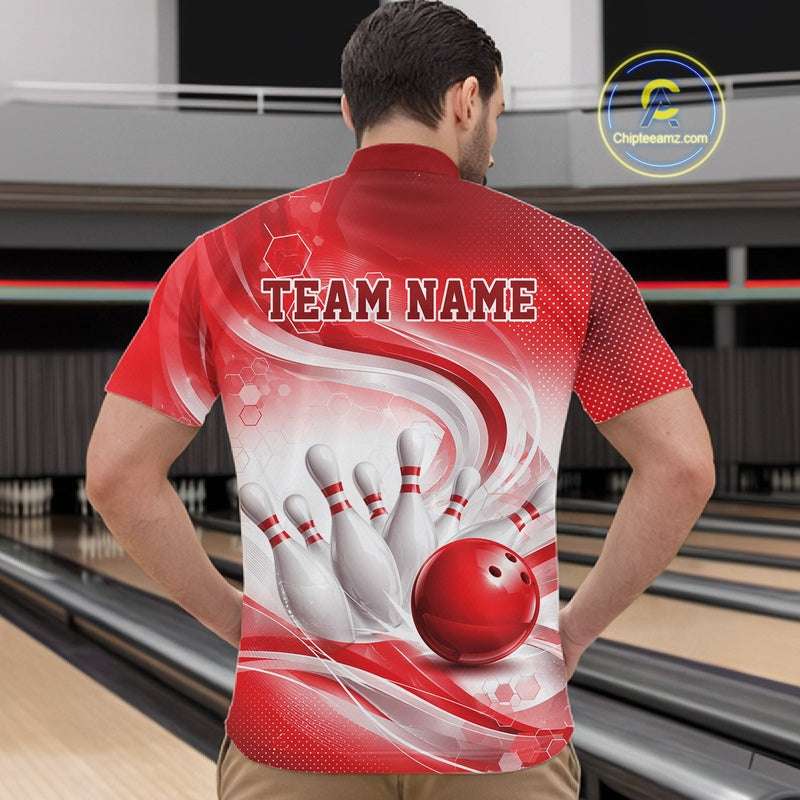 Male model standing in a bowling lane wearing a white and red bowling quarter-zip shirt featuring abstract wave lines and a glossy bowling ball striking pins on the front.