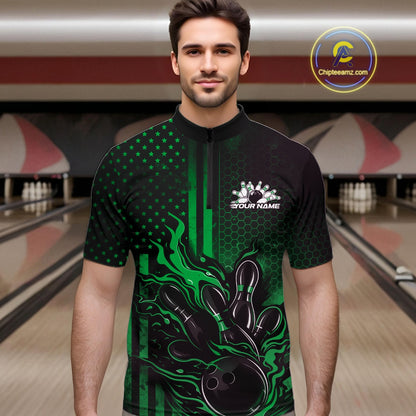 Male model wearing a black and green bowling quarter-zip shirt at a bowling lane with patriotic bowling strike artwork and fiery graphics.