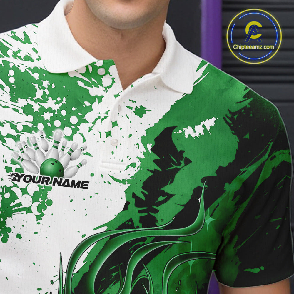 Close up left chest of bowling polo shirt, black fabric with green and white flame bowling ball and pins emblem, detailed apparel branding view