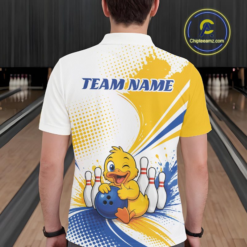 A person shown from behind wearing a custom bowling-themed short-sleeve polo shirt. The shirt features a white base with a large yellow and blue graphic design, including a cartoon duck holding bowling pins and the text 'TEAM NAME'.