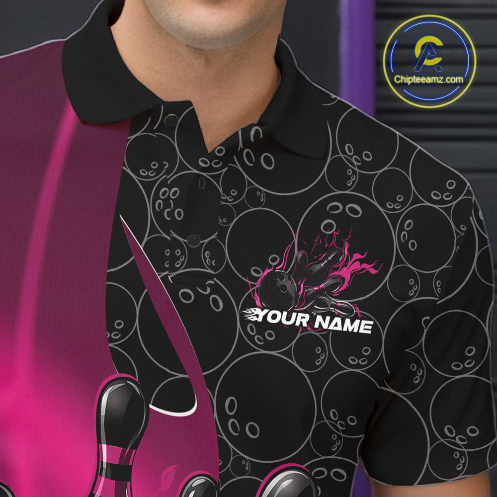 Close-up view of the left chest of a black and pink bowling polo shirt showing gradient bowling ball pattern with flaming black bowling ball striking pins detail.