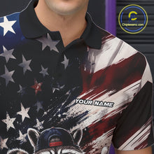Load image into Gallery viewer, Close-up of the left chest on a bowling polo shirt featuring a raccoon in patriotic sunglasses rolling a bowling ball through scattered pins with a distressed American flag backdrop.