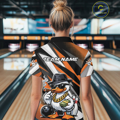 Back view female model in bowling lane wearing quarter-zip shirt with duck sunglasses fedora cash cigar bowling artwork beside pins