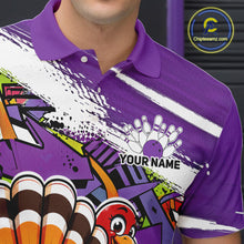 Load image into Gallery viewer, Close up front view of the left chest area on a purple custom bowling polo shirt, featuring a graffiti inspired urban street style design with paint splatter accents and a personalized name.