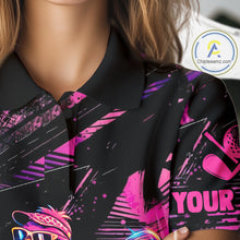 Load image into Gallery viewer, Black shirt with pink and purple designs and text held by a person