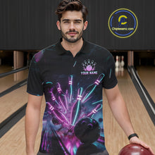 Load image into Gallery viewer, Man wearing a black bowling-themed shirt with colorful graphics in a bowling alley.