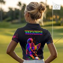 Load image into Gallery viewer, Woman wearing a black polo shirt with a colorful dog graphic and logo.