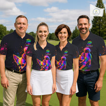 Load image into Gallery viewer, Four people wearing black polo shirts with colorful dog designs on a golf course.