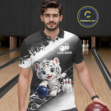 Load image into Gallery viewer, Man wearing a black and white polo shirt with a tiger design on a bowling alley.