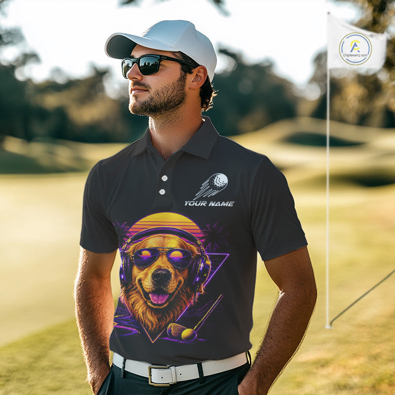 Man wearing a black polo shirt with a dog graphic on a golf course