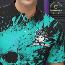 Load image into Gallery viewer, Teal and black splatter patterned polo shirt with bowling design and customizable text on a blurred background.