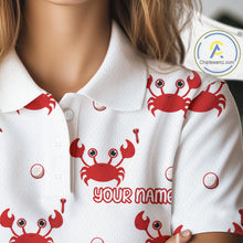 Load image into Gallery viewer, White shirt with red crab patterns and 'Your Name' text, brand logo visible