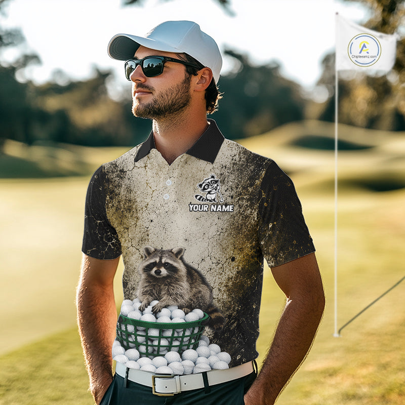 Man wearing a golf-themed shirt with a raccoon design on a golf course
