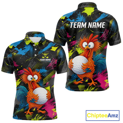 Front and back views of a short-sleeve polo shirt on a white background. The shirt features a black base with a vibrant multicolor abstract paint splatter pattern in blue, green, yellow, and pink, along with a cartoon orange rooster holding a white golf ball.
