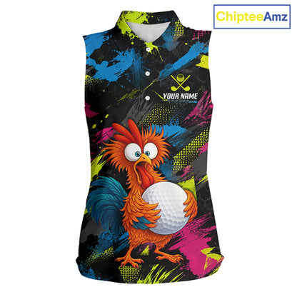 A sleeveless collared golf shirt with a vibrant, colorful graphic print featuring a cartoon rooster holding a golf ball. The shirt has a black base with bright blue, pink, yellow, and orange paint splatters and a custom name print area on the chest.
