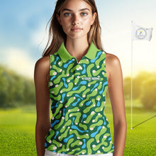 Load image into Gallery viewer, Woman wearing a green patterned sleeveless shirt on a golf course with a flag in the background.