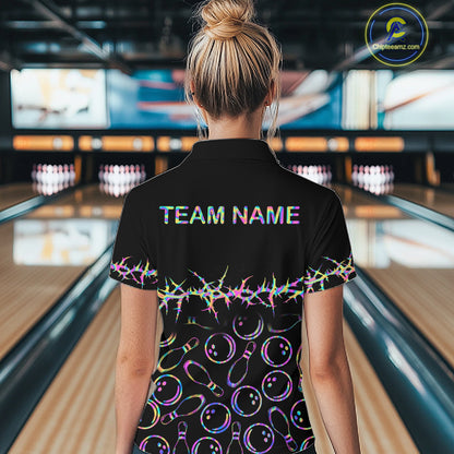 Person wearing a bowling shirt with a pink logo and 'TEAM NAME' text in a bowling alley.
