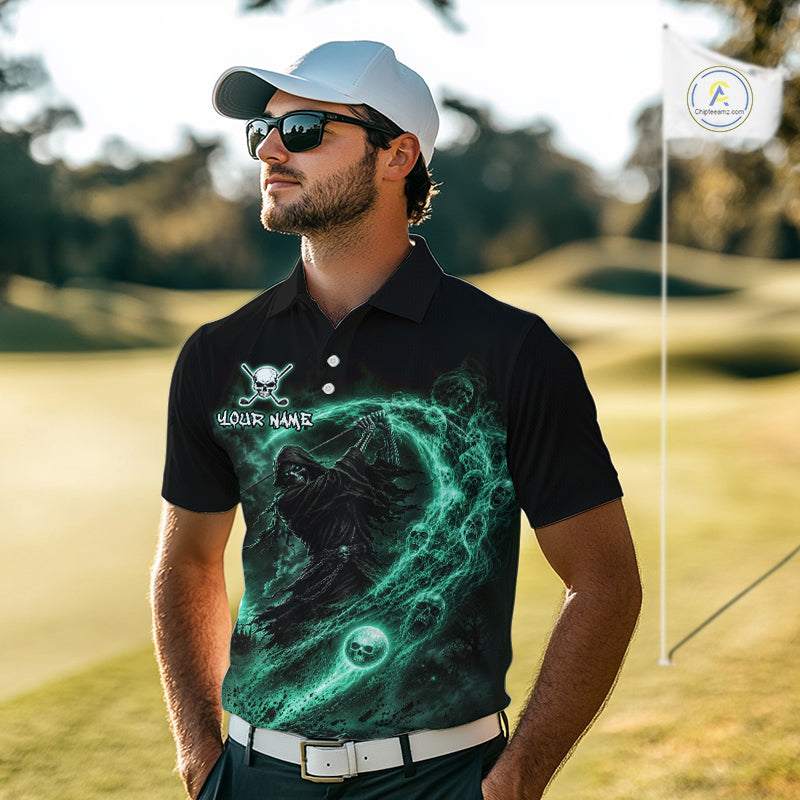 Man wearing a black golf shirt with a green graphic design on a golf course