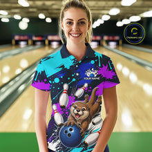 Load image into Gallery viewer, Woman wearing a colorful bowling shirt with an otter and bowling ball design in a bowling alley.