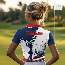Load image into Gallery viewer, Woman on a golf course wearing a American flag patriotic custom name white golf shirt with 'TEAM NAME' on the back.