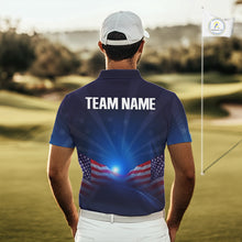 Load image into Gallery viewer, Man wearing a blue polo shirt with an American flag design and 'TEAM NAME' text on a golf course.