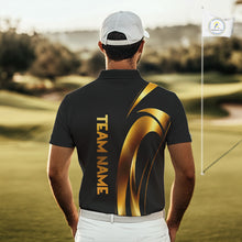 Load image into Gallery viewer, Man wearing a black and gold polo shirt with 'TEAM NAME' on the back, standing on a golf course.