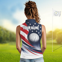 Load image into Gallery viewer, A woman wearing an American flag patriotic sleeveless golf polo shirt, with "Team Name" on the back and standing in the golf course.