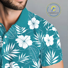 Load image into Gallery viewer, Teal shirt with white floral and leaf pattern worn by a person with breathable fabric