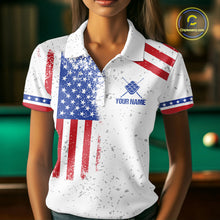 Load image into Gallery viewer, Woman wearing a white American flag 9 ball billiard jersey beside a pool table front view.