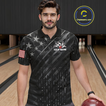 Man wearing a black American flag wings bowling polo shirt at a bowling alley front view.