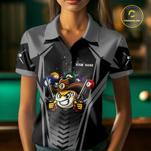 Load image into Gallery viewer, Woman wearing a grey 9 ball cowboy billiard jersey beside a pool table front view.