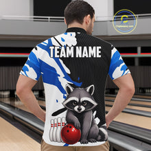 Load image into Gallery viewer, Person wearing a bowling-themed shirt with a raccoon graphic in a bowling alley.