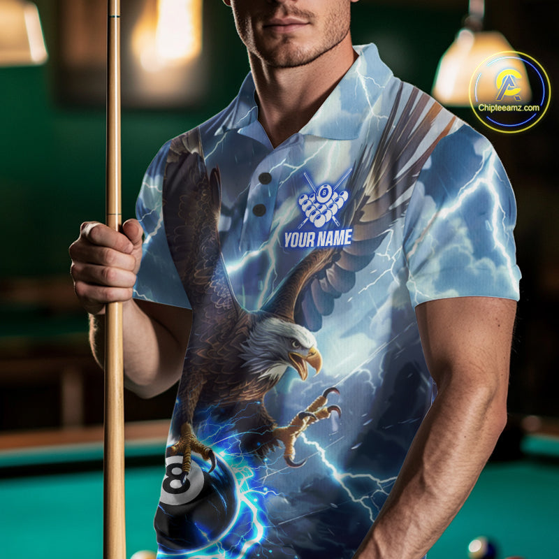 Man wearing a blue thunder eagle billiard jersey beside a pool table front view.
