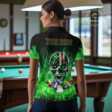 Load image into Gallery viewer, Back view of woman wearing a green flame eagle skull pool team shirt in a billiards hall.