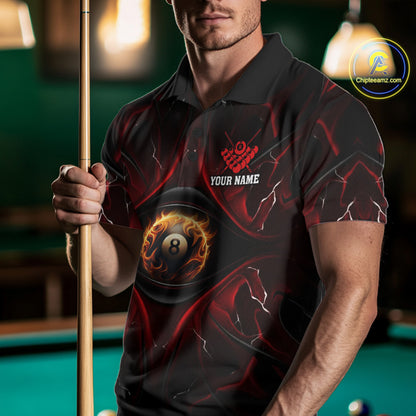 Man wearing a black and red flame 8 ball billiard jersey beside a pool table front view.