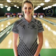 Load image into Gallery viewer, Woman wearing a grey American flag bowling polo shirt at a bowling alley front view.
