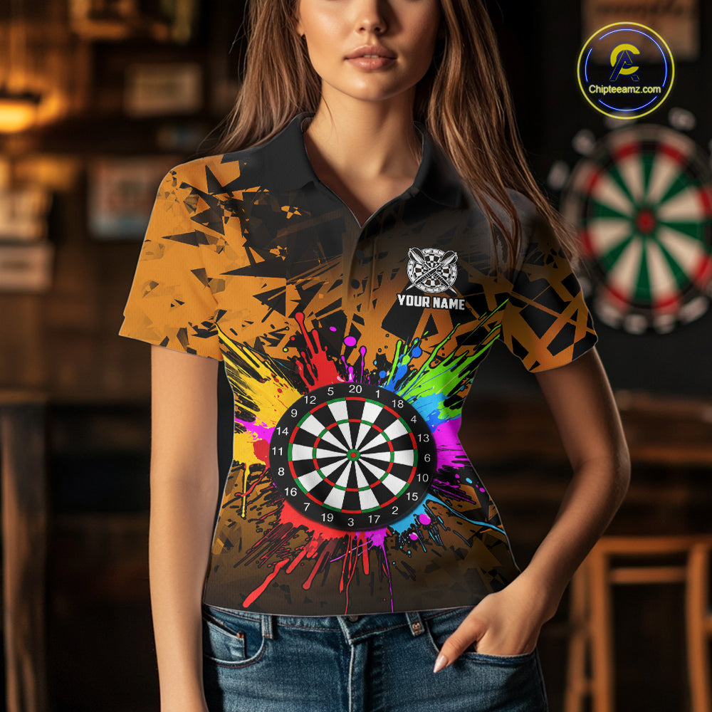 Woman wearing an orange dartboard darts shirt during darts match front view.