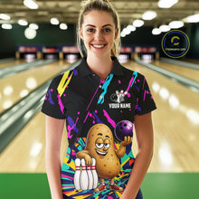 Load image into Gallery viewer, Woman wearing a colorful potato bowling polo shirt at a bowling alley front view.