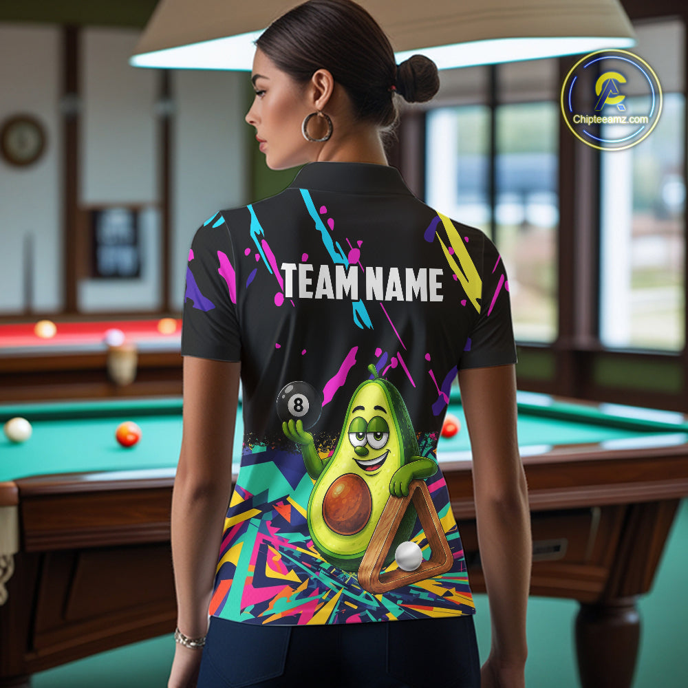 Back view of woman wearing a colorful avocado 8 ball pool shirt in a billiards hall.
