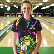 Load image into Gallery viewer, Woman wearing a colorful bowling-themed shirt with a frog graphic in a bowling alley.