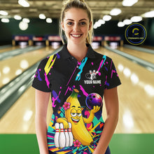 Load image into Gallery viewer, Woman wearing a colorful bowling shirt with a cartoon banana character in a bowling alley.