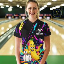 Load image into Gallery viewer, Woman wearing a colorful bowling shirt with a cartoon banana character in a bowling alley.