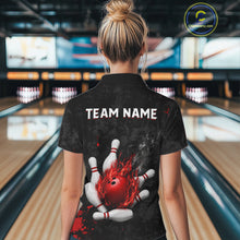 Load image into Gallery viewer, Woman wearing black and red grunge fire bowling polo shirt back view.
