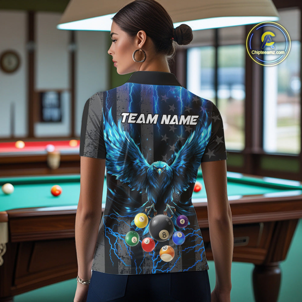 Back view of woman wearing a blue lightning eagle pool shirt inside a billiards hall.